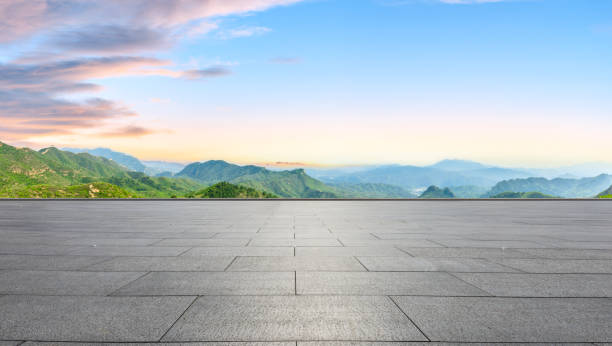 istock Clean square floor and mountain natural landscape at sunrise 1012178364