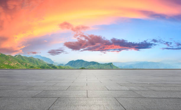 istock Clean square floor and mountain natural landscape at sunrise 1012178366