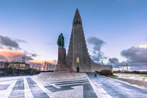 Reykjavik - May 01, 2018: Leif Erikson statue at the Hallgrimskirkja church in the center of Reykjaivk, Iceland Reykjavik - May 01, 2018: Leif Erikson statue at the Hallgrimskirkja church in the center of Reykjaivk, Iceland high temple stock pictures, royalty-free photos & images