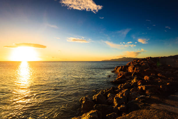 istock Sea next to rock coastline 1012190402