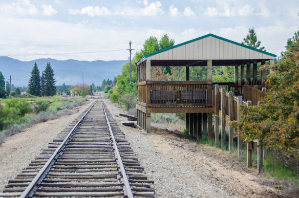 istock Rural Mountain Railroad Platform Waiting for Train and Passengers 1012195246