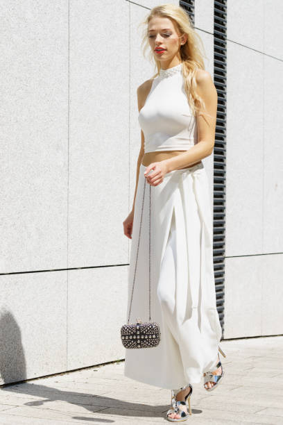 istock Woman wearing crop top and culottes 1012195486