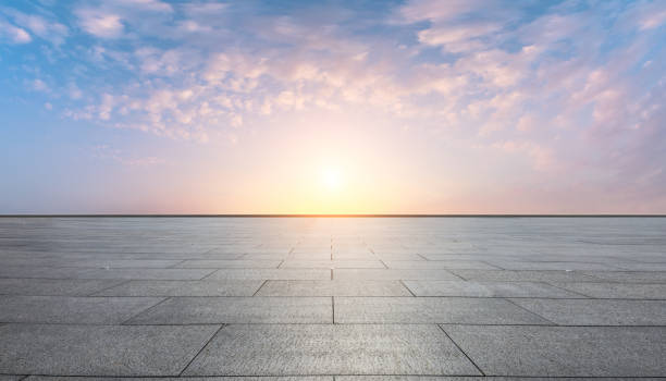istock Square floor and beautiful colorful sky clouds at sunrise 1012202546
