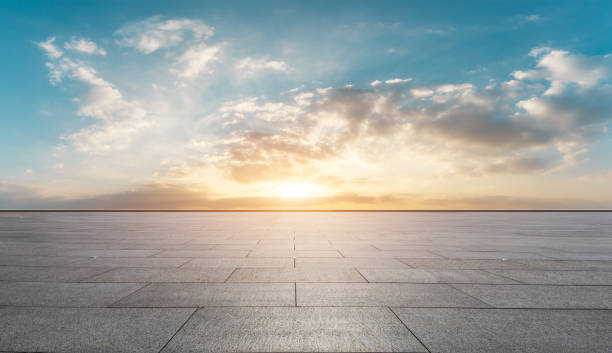 istock Square floor and beautiful colorful sky clouds at sunrise 1012202594