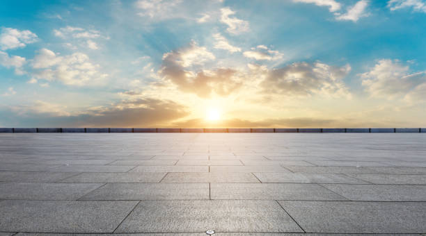 istock Square floor and beautiful colorful sky clouds at sunrise 1012202966