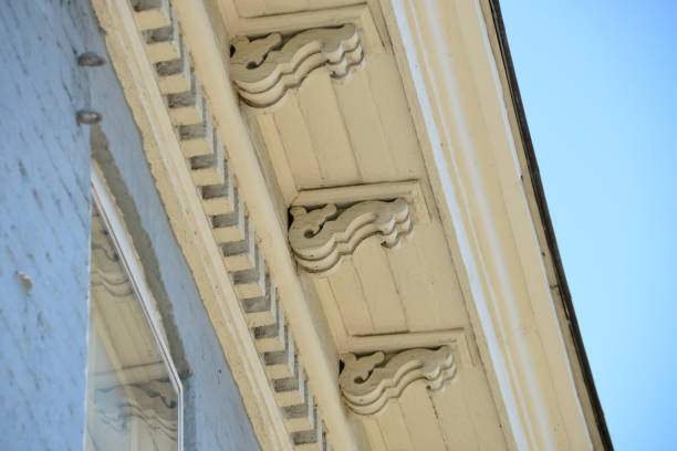 istock Vintage corbels and dentil molding on old building 1012225702