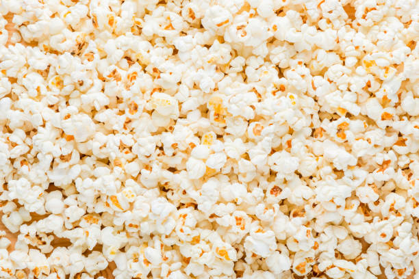 istock food background - cooked salted popcorn close up 1012230190