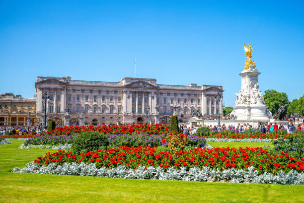 The principal facade of Buckingham Palace the London residence and administrative headquarters of the monarch of the United Kingdom. Located in the City of Westminster, the palace is often at the centre of state occasions and royal hospitality. buckingham palace photos stock pictures, royalty-free photos & images