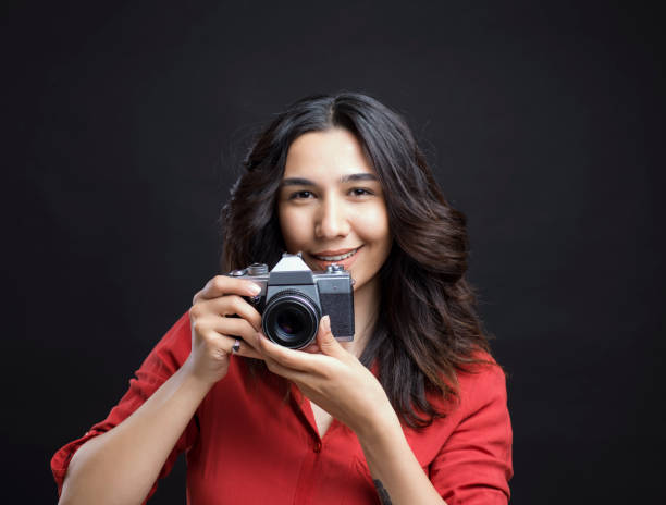 istock Female Photographer 1012266634