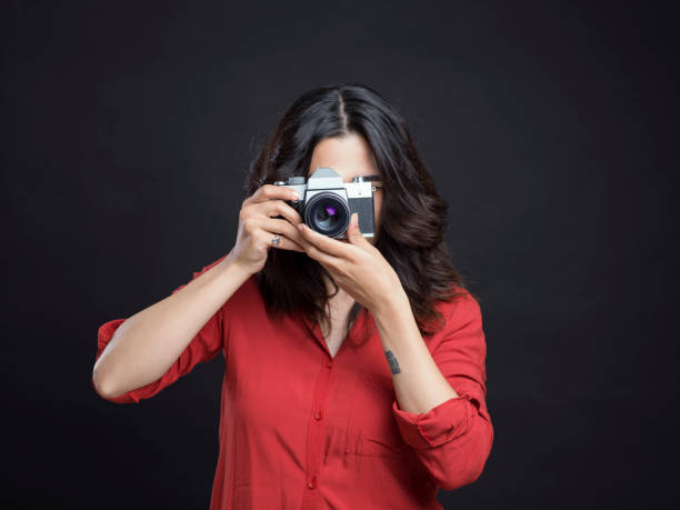 istock Female Photographer 1012266660