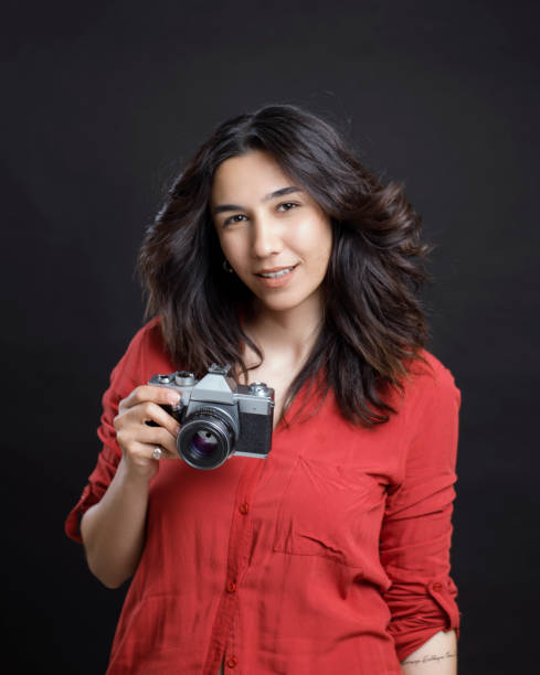 istock Female Photographer 1012266674
