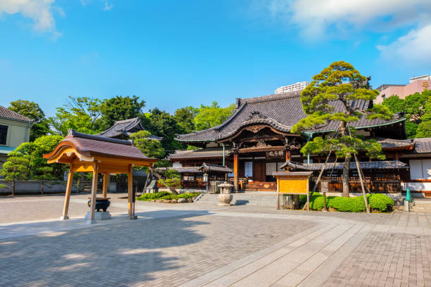 Sengakuji Temple in Tokyo, Japan TOKYO, JAPAN - APRIL 20 2018: Sengakuji Temple famous for its graveyard where the "47 Ronin" are buried. The story of the 47 loyal ronin remains one of the most popular historical stories in Japan harakiri photos stock pictures, royalty-free photos & images