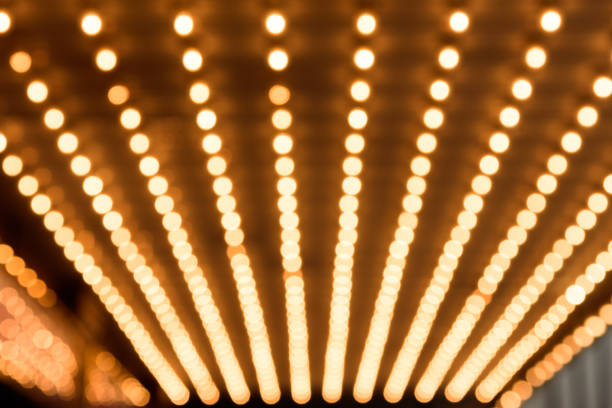 marquee lights Rows of illuminated globes under the marquee as often used at entrance to theatres and casinos stage theater photos stock pictures, royalty-free photos & images