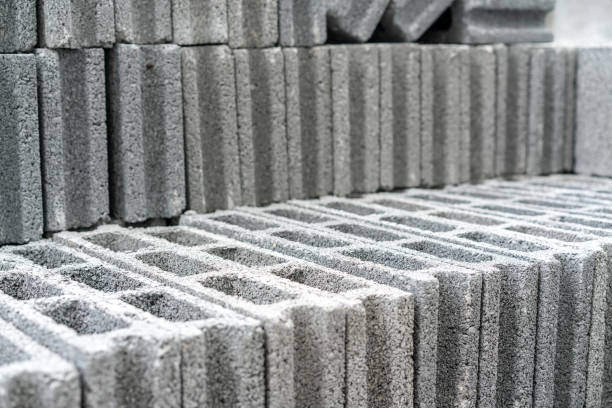 blocs de béton pour la construction, fond et texture avec mise au point sélective - hollow gray pattern wall photos et images de collection