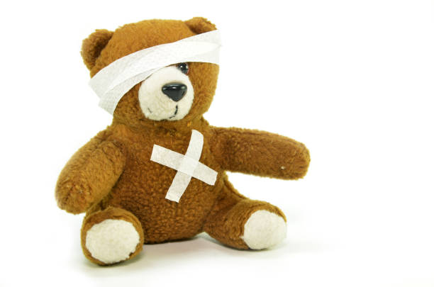 istock Injured teddy bear with bandages 1012309036