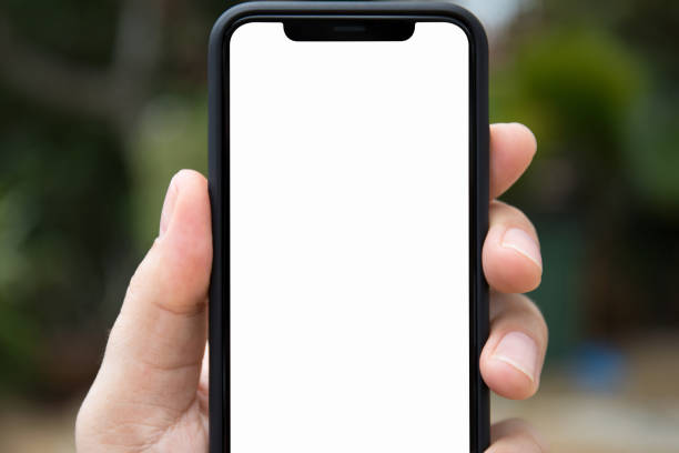 istock man hand holding phone with isolated screen on background nature 1012312928