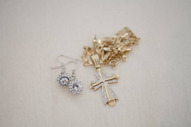 istock Crucifix necklace worn by a bride 1012315458