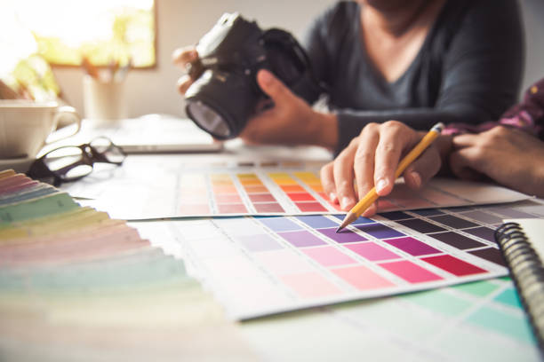 istock designer graphic creative ,creativity woman  working on camera and designing  coloring color ideas style 1012321328