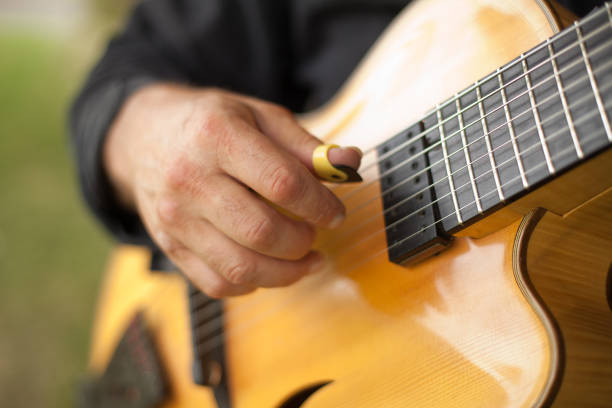 istock Detail of guitarist playing seven string guitar 1012328708