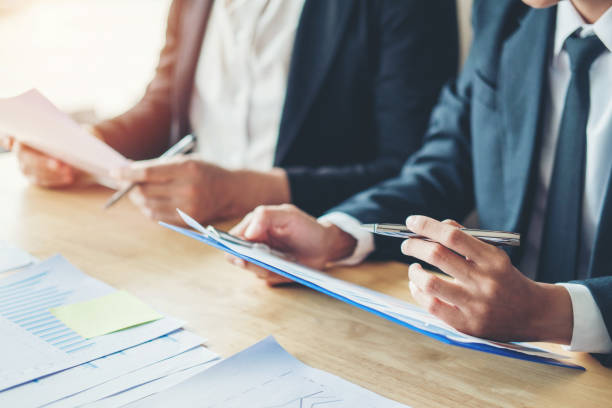 istock Business team colleagues meeting Planning Strategy Analysis discussing new plan financial on graph data new business project 1012329062