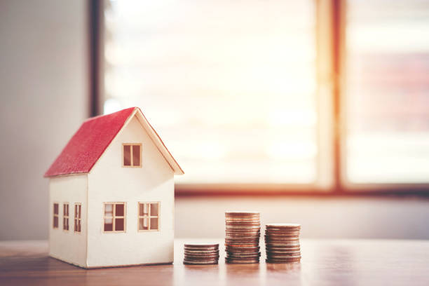 istock Saving money concept calculator cost for Home 1012329076