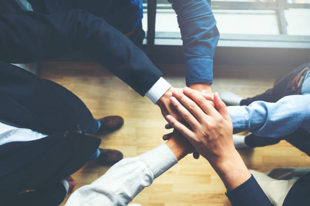 istock Business Teamwork joining hands team spirit Collaboration Concept 1012329152
