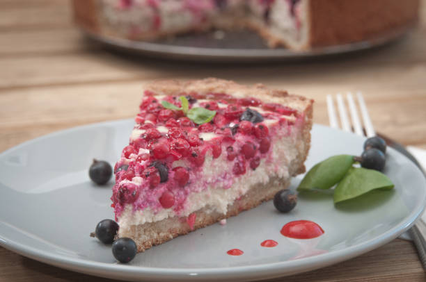 istock Cheese cake with berries of red and black currants. 1012345214