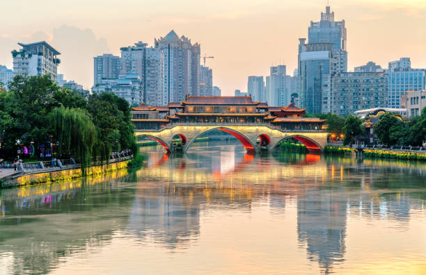istock Nine hole bridge and skyscraper in chuengdu,china 1012357146