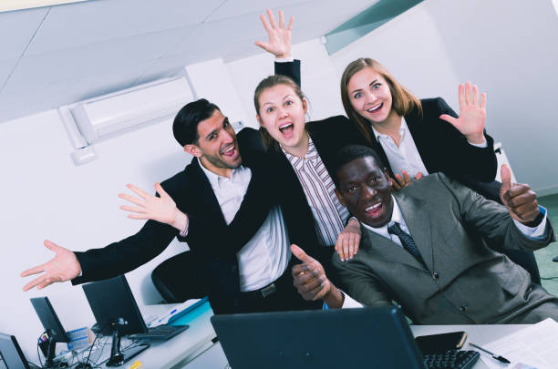 istock friendly group of managers  in the office 1012357608