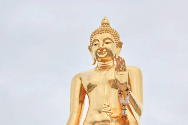 istock Statue of Buddha with white background. 1012360440
