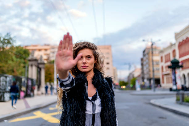 istock Woman Gesturing Stop Sign 1012363512