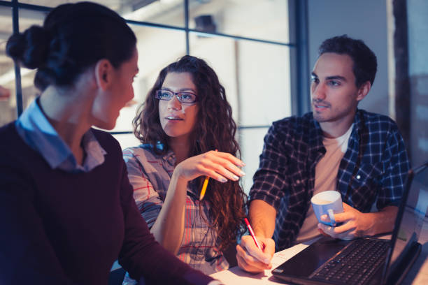 istock Group of young architects working together in architecture studio 1012369340