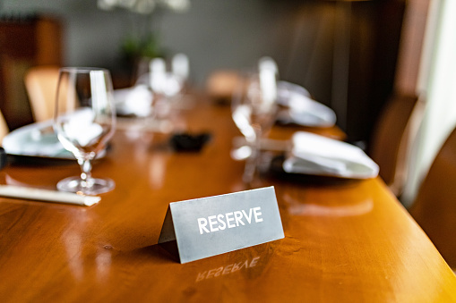 Reserved sign on a table in a restaruant