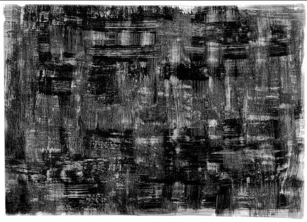 istock Raw and harsh multilayered seamless black background with visible lines and brush traces painted by thick paint 1012381024