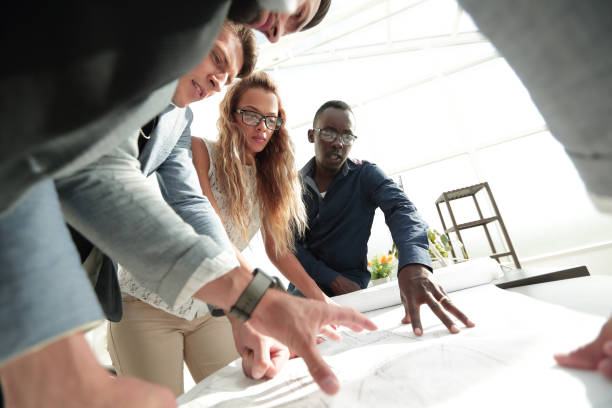 istock close up.a group of architects are working on a new project 1012381826