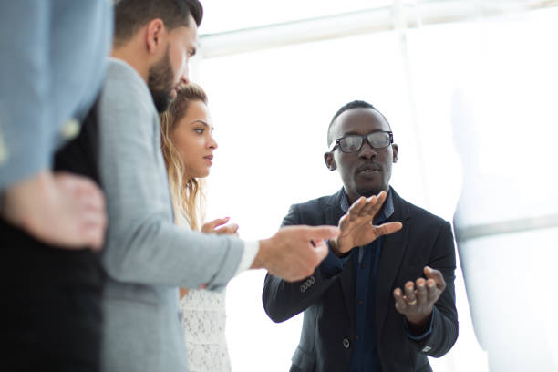 istock close up.young employees discuss ideas for a new project 1012384550