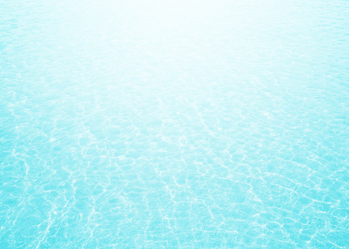 Blue water cool sea beach texture background on horizon tropical sandy.