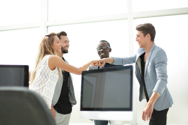 istock friendly business team in a modern office 1012398442