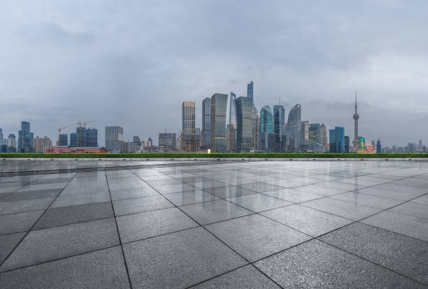 istock Panoramic skyline and buildings with empty concrete square floor 1012401576
