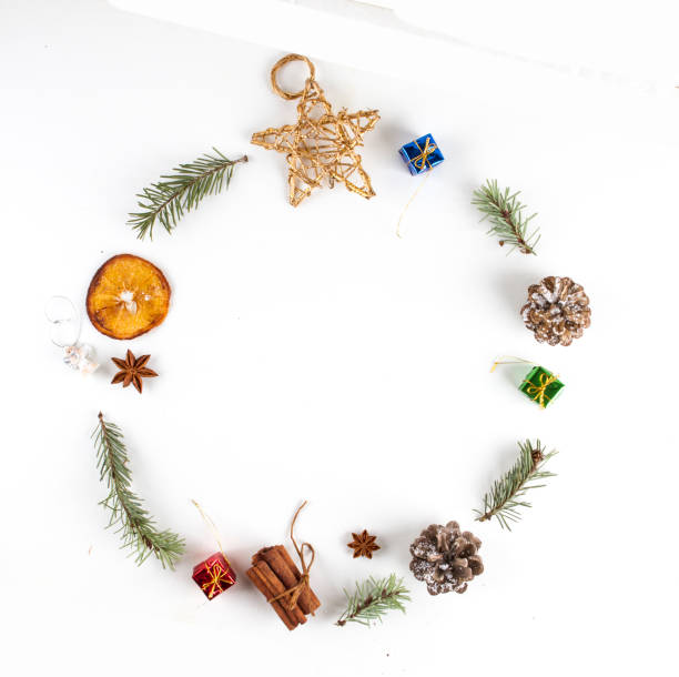istock MANY CHRISTMAS ORNAMENTS IN CIRCLE. DECORATIVE ELEMENTS ON WHITE BACKGROUND 1012404544