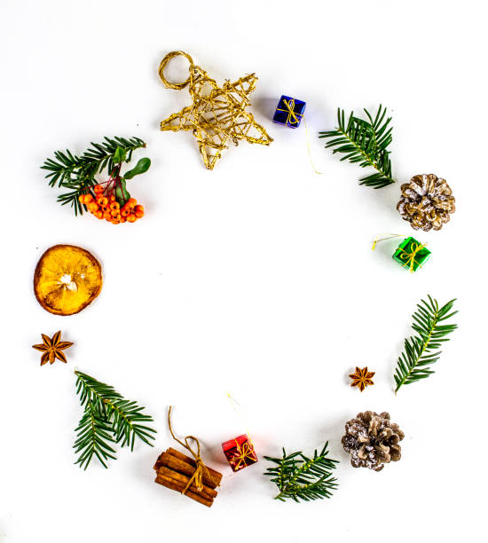 istock MANY CHRISTMAS ORNAMENTS IN CIRCLE. DECORATIVE ELEMENTS ON WHITE BACKGROUND 1012404894