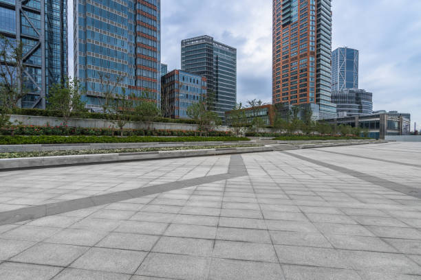 istock empty pavement and modern buildings in shanghai