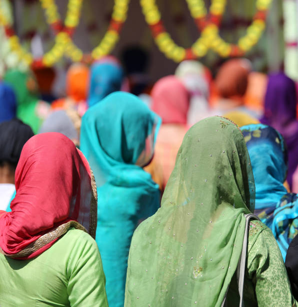 istock sikh women with veil on the heads 1012411662