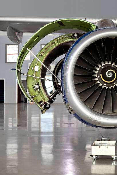 Airplane Jet Turbine Engine maintenance in hangar stock photo