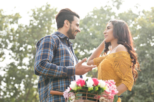 istock Happy Indian couple at park 1012412062