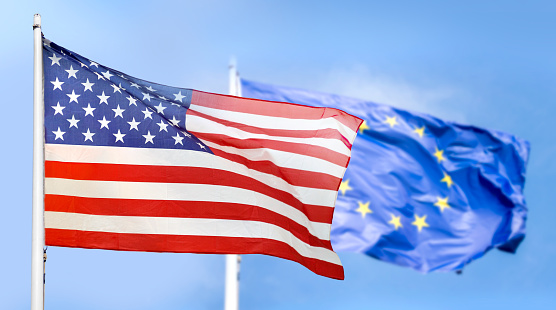 Flag USA and Europe isolated on sky background