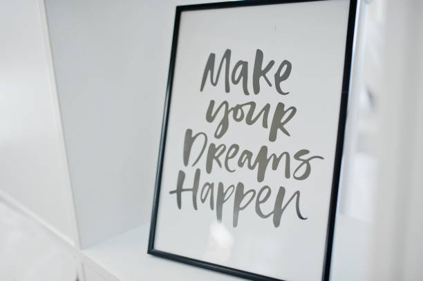 istock Framed picture with motivational saying on it on light background. 1012438876