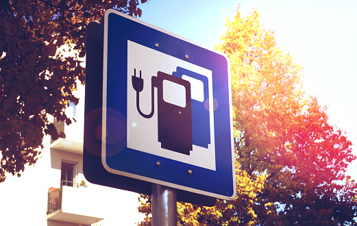 Road sign for electric vehicle charging stations