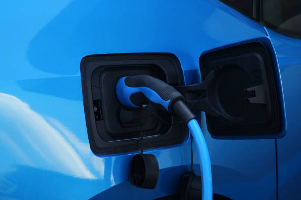 istock Electric vehicle charging on charge station 1012445392