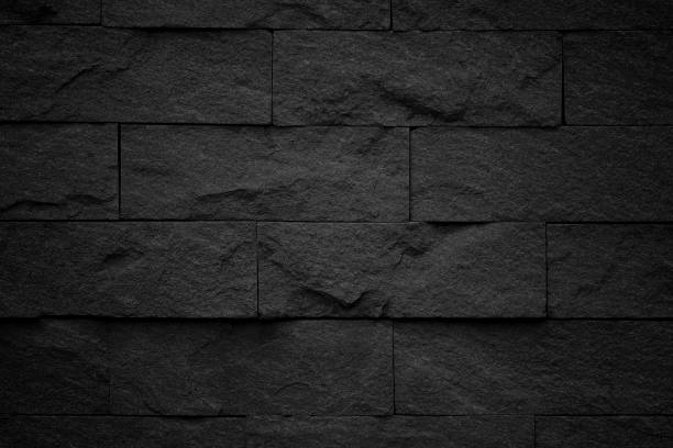 istock Dark grey black slate background or natural stone texture. 1012445712